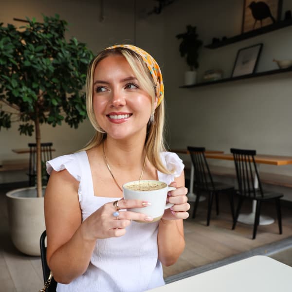 Lauren with another drink from ā Café